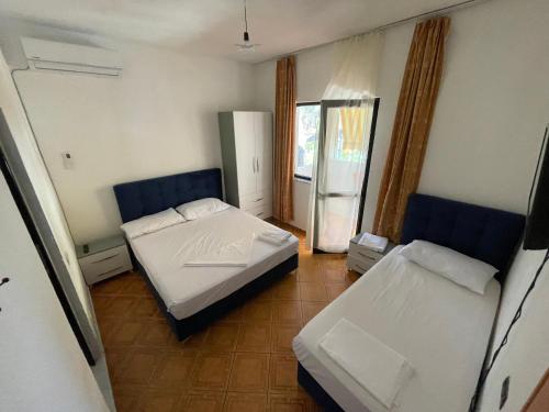 Postel nebo postele na pokoji v ubytování Hotel Ani