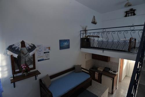 Ένα ή περισσότερα κρεβάτια σε δωμάτιο στο Nefeli Apartments