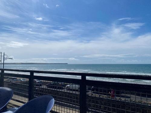 a view of the ocean from a balcony at Holiday Apartment Iris in Waterford