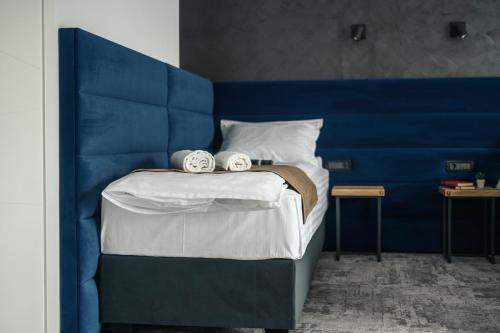 Ένα ή περισσότερα κρεβάτια σε δωμάτιο στο GBU Home Timisoara