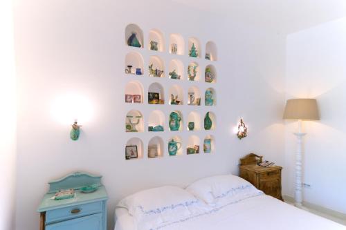 Una cama o camas en una habitación de Blu OltreMare