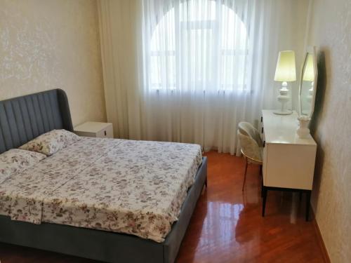 Ένα ή περισσότερα κρεβάτια σε δωμάτιο στο Gates of Baku