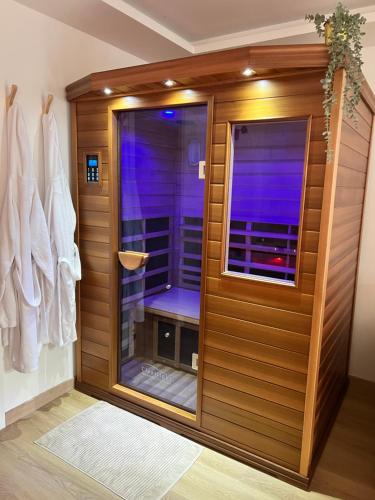 a room with a sauna with a window in it at L’Eden d’Opale in Coquelles