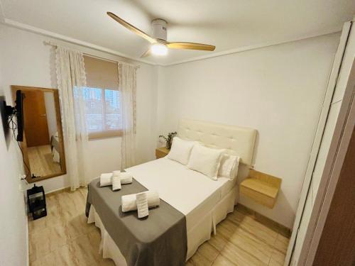 Postel nebo postele na pokoji v ubytování Fantástico apartamento en BENIDORM