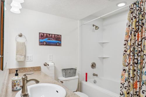 a bathroom with a sink and a shower at Cozy American Fork Retreat with Electric Fireplace in American Fork