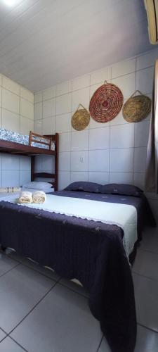 a bedroom with a large bed in a room at Recanto Dos Lençóis in Barreirinhas