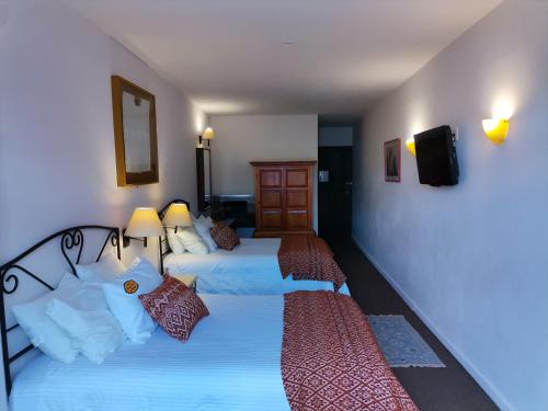 Letto o letti in una camera di Posada Real de Chiapas