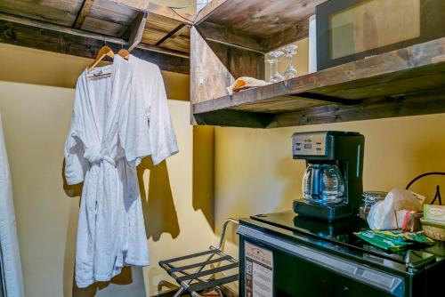 a white shirt hanging on a shelf in a kitchen at Dancing Bear Lodge in Townsend