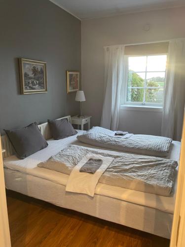 Ένα ή περισσότερα κρεβάτια σε δωμάτιο στο Lindelunda