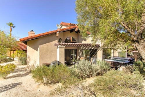 a small house with a table in front of it at Borrego Springs Condo with Private Hot Tub and Views! in Borrego Springs
