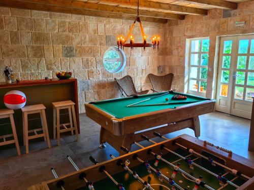 a ping pong table in a room with a pool table at NEW 2023 Villa Tree of Life in Sveti Petar