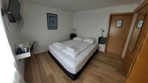 Ένα ή περισσότερα κρεβάτια σε δωμάτιο στο Grundarfjordur Bed and Breakfast
