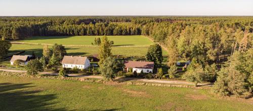 an aerial view of a house in a field at Chata w lesie in Zagwiździe