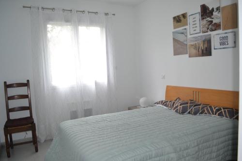 Posteľ alebo postele v izbe v ubytovaní Maison cosy tout confort dans un cadre de verdure
