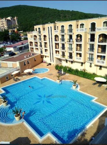 an overhead view of a large swimming pool in a building at Villa Astoria 5. Sveti Vlas k.k. Elenite in Sveti Vlas