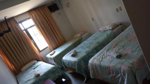 Postel nebo postele na pokoji v ubytování Beiruth Hotel