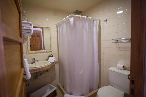 Ванная комната в Hotel Rosario La Paz
