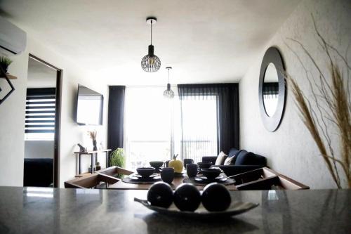 a living room with a couch and a table at Comfort Flat In Guadalajara in Guadalajara
