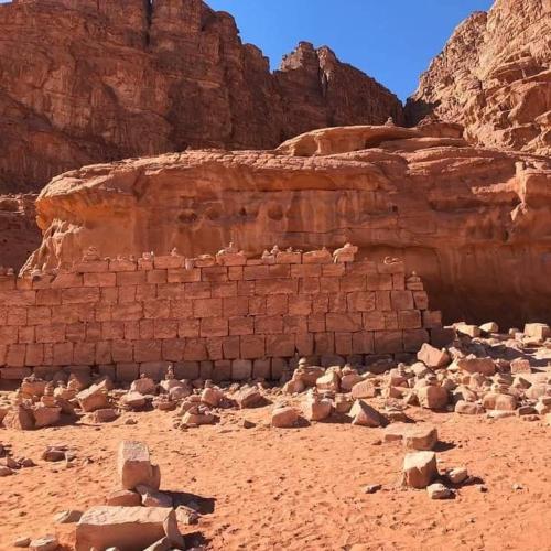 a pile of rocks in the desert at blueskyrum. in Wadi Rum