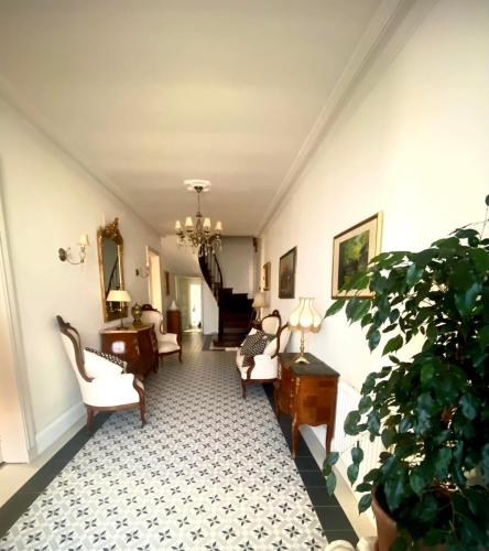 Χώρος καθιστικού στο Le Grand Berger Chambres D'Hotes