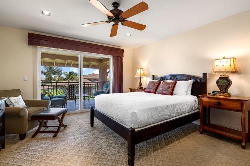 En eller flere senge i et værelse på Halii Kai 24G