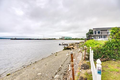 a house on the shore of a body of water at Massachusetts Vacation Rental 5 Mi to Fall River in Somerset