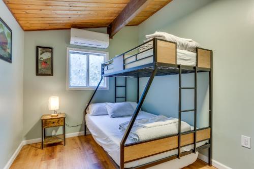 a bedroom with two bunk beds in a room at East Stroudsburg Home Near Skiing and Del Water Gap! in East Stroudsburg