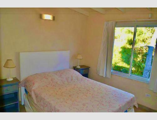 Ένα ή περισσότερα κρεβάτια σε δωμάτιο στο Hermoso Duplex en la mejor zona de Pinamar!
