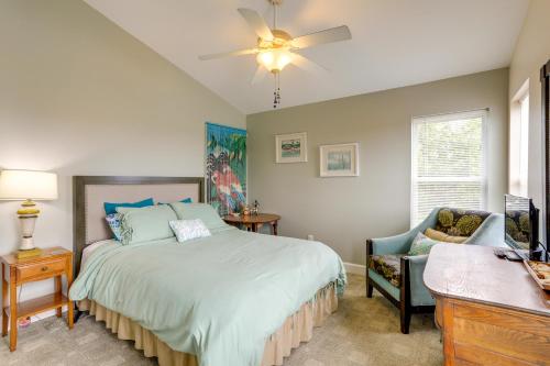 a bedroom with a bed and a ceiling fan at Indian Rocks Vacation Rental Condo Steps to Beach in Clearwater Beach