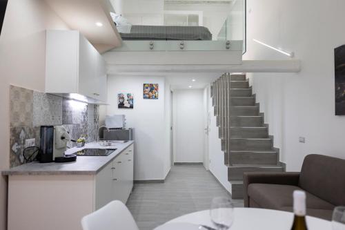 Η κουζίνα ή μικρή κουζίνα στο Aurora House Loft