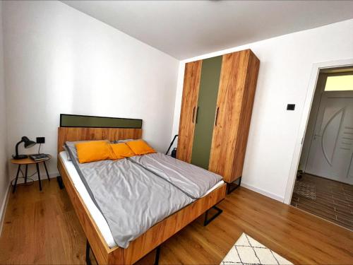 Llit o llits en una habitació de Apartman Amna