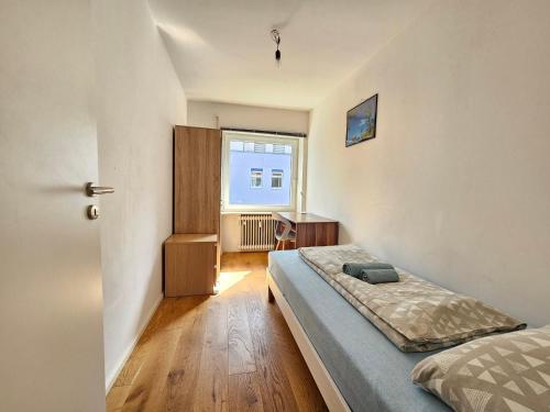 Katil atau katil-katil dalam bilik di Wohnreich Blaustein Mitte -2A- 3er WG