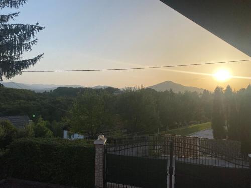 a view of the sunset from the balcony of a house at Villa Gagula in Sarajevo