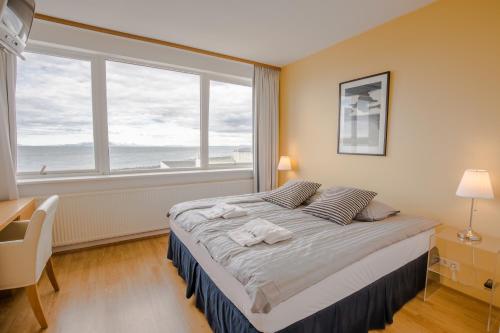 Un ou plusieurs lits dans un hébergement de l'établissement Hotel Keilir by Reykjavik Keflavik Airport
