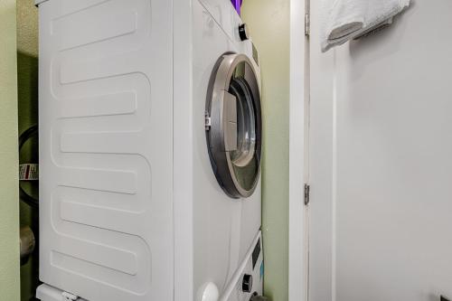 a washer and dryer in a white refrigerator at Oceanside Skies in Oceanside