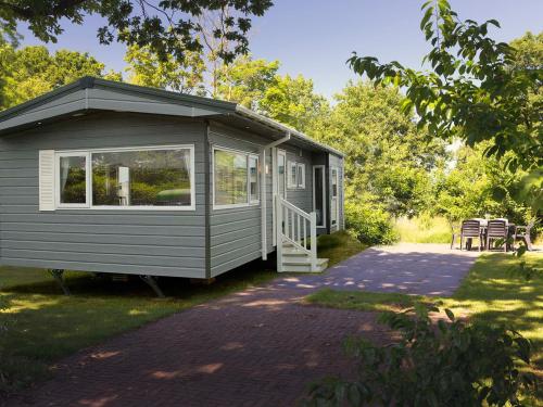 Comfortable chalet with garden, located in a holiday park near nature reserve
