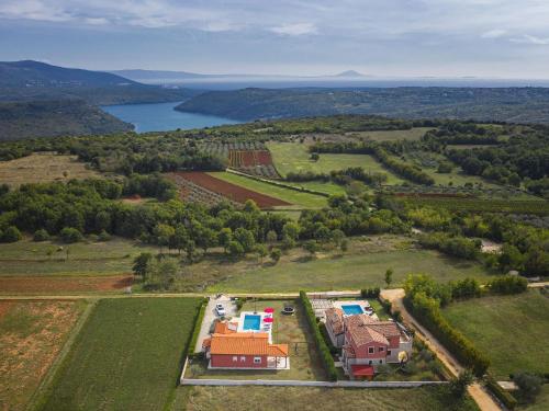 an aerial view of a house in a field at Villa in Barban near Beach & Pool in Rebići