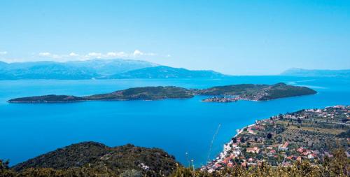 a group of islands in a large body of water at Holiday Tolofona Beach in Eratini