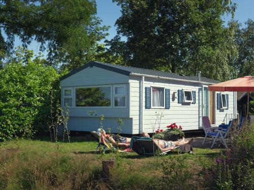 Carefully furnished chalet with a garden, close to nature