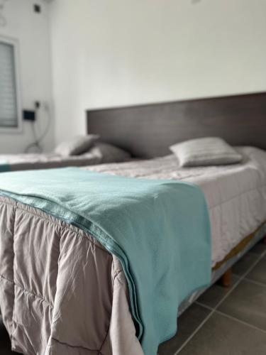 Postel nebo postele na pokoji v ubytování Bv. Sarmiento