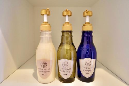 three bottles of wine sitting next to each other at Nenenomichi in Kyoto
