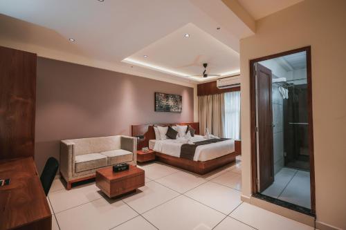 Postel nebo postele na pokoji v ubytování Fortview Suites