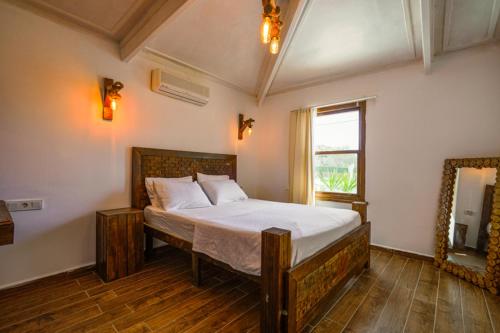 Katil atau katil-katil dalam bilik di Belong Otel
