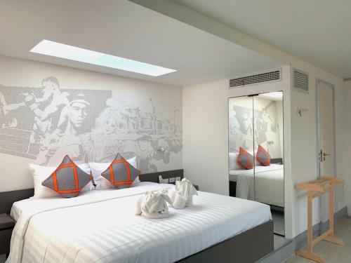 Postel nebo postele na pokoji v ubytování Tao Resort and Villas (SHA Extra+)