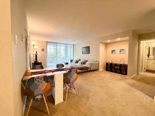a living room with a couch and a table and chairs at Luxury Marina Unit 2 Bedrooms 2 Bathrooms in Los Angeles