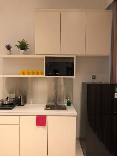Кухня или мини-кухня в Monde Residence I no 6 Batam Centre
