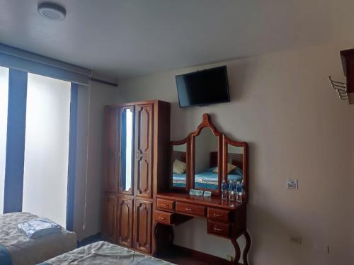 Postel nebo postele na pokoji v ubytování Hotel Villonaco