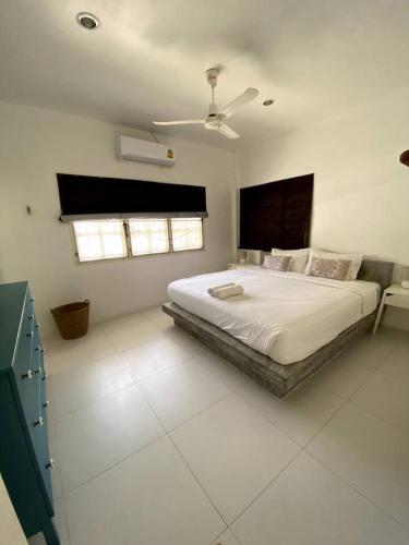 Ένα ή περισσότερα κρεβάτια σε δωμάτιο στο Orchid Villa
