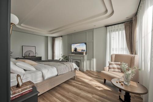 Postel nebo postele na pokoji v ubytování Davilla Đà Lạt Villa Collection
