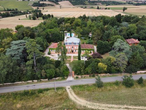 an aerial view of a house on a road at Ch&acirc;teau Lamothe in Bazi&egrave;ge